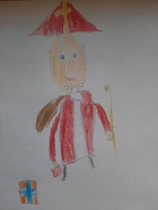 Kinderzeichnung einer Person mit rotem Hut