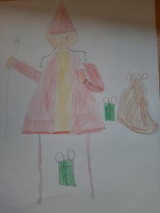 Kinderzeichnung eines Mannes mit rotem Mantel