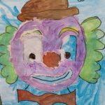 Buntes Kinderbild eines fröhlichen Clowns Gesicht
